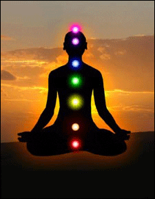 A person sitting in the lotus position with seven colored lights on their head.
